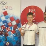 Az ezüstérmes Bagi Ádám és edzője, Ruzsinszki György.